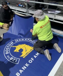 2024 Peppi installing the Boston Marathon finish line 
